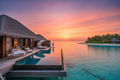 Luxury overwater bungalow villa in the Maldives at sunset